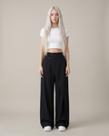 Baggy broek met asymmetrische taille in zwart - vooraanzicht