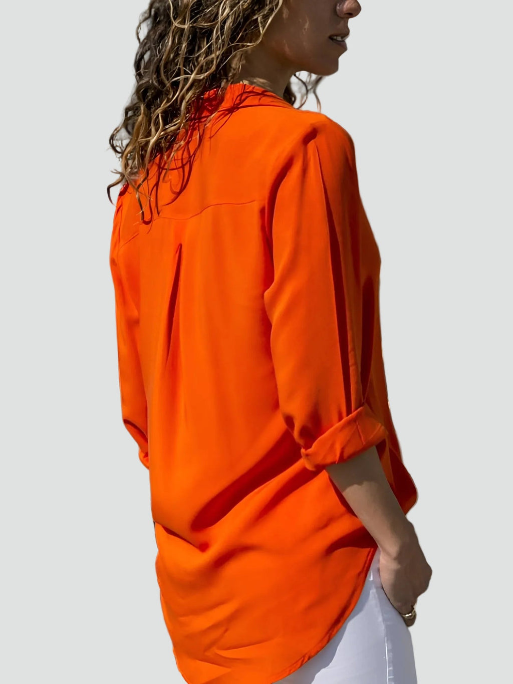Bella Novelle losvallende damesblouse met lange mouwen in oranje
