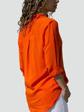Bella Novelle losvallende damesblouse met lange mouwen in oranje