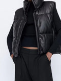 Bella Novelle bodywarmer in leerlook in zwart