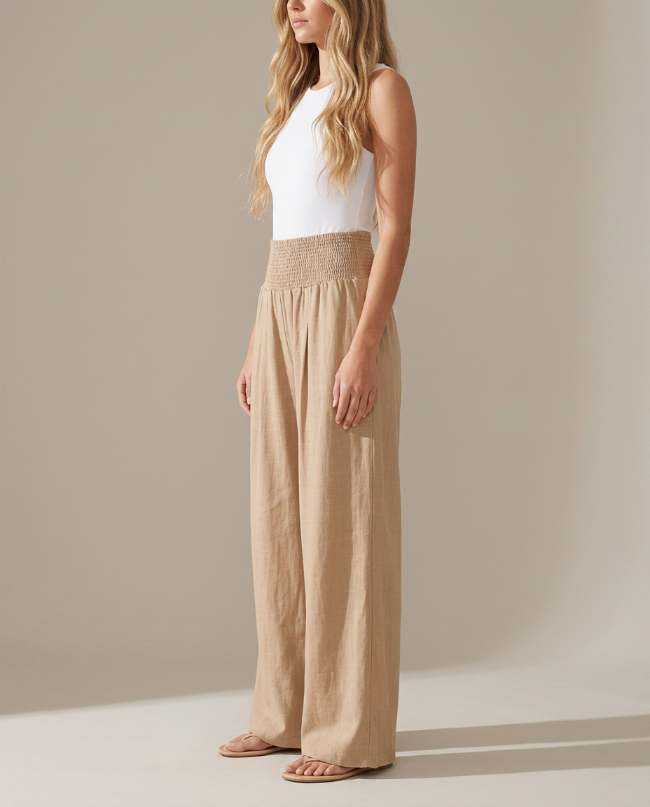 Strandbroek met wijde pijpen in beige - zijaanzicht