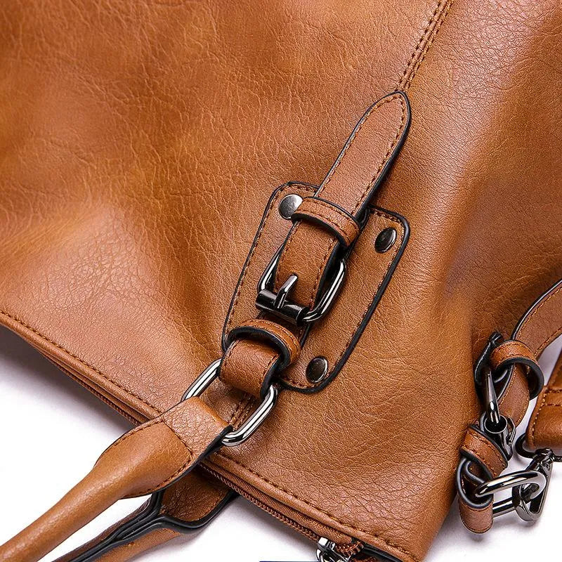 Bella Novelle handtas met gespen, productfoto