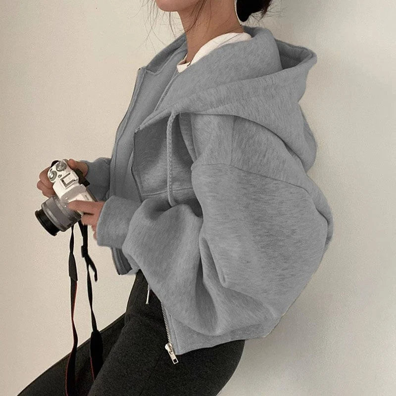 Bella Novelle cropped oversized hoodie met rits in lichtgrijs