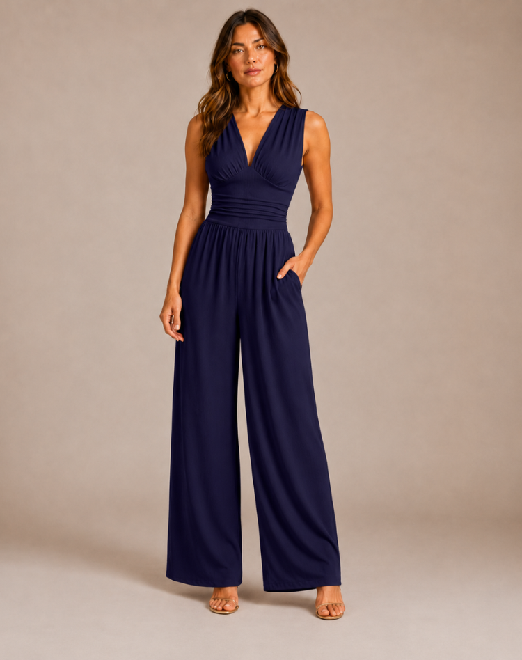 Bella Novelle jumpsuit met diepe V-hals en wijde pijpen in marineblauw