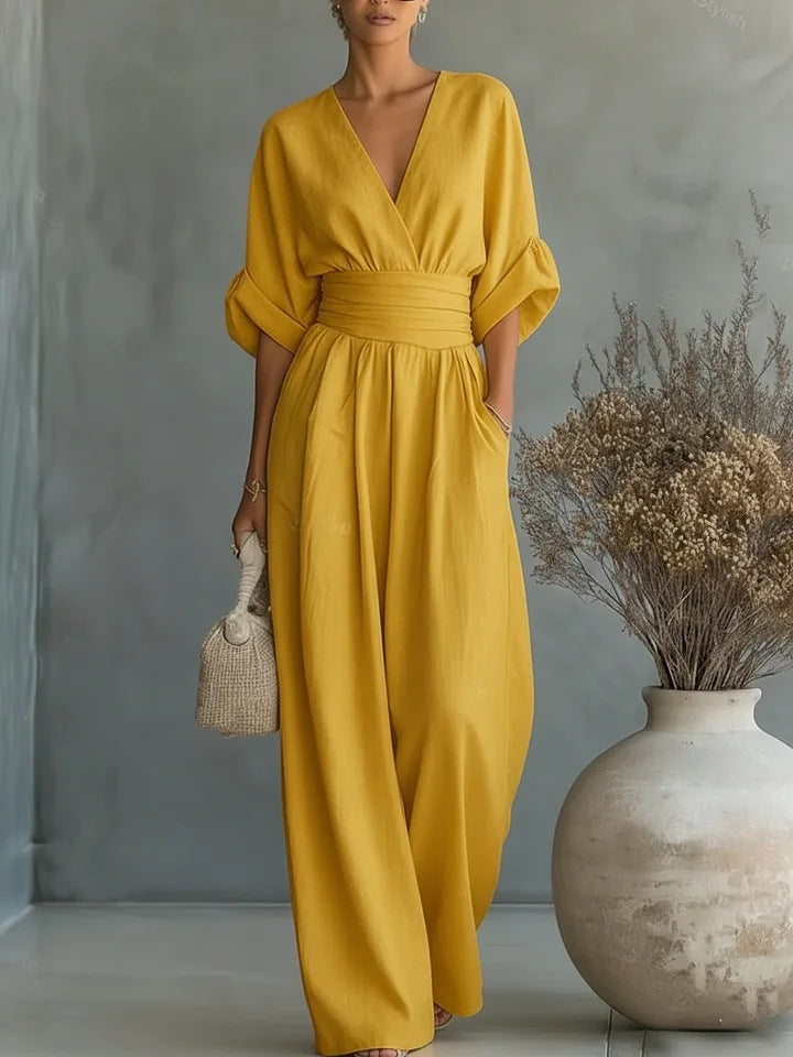 Bella Novelle damesjumpsuit met V-hals en wijde pijpen in geel