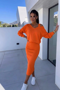 Bella Novelle set met aansluitende jurk en sweatshirt in oranje
