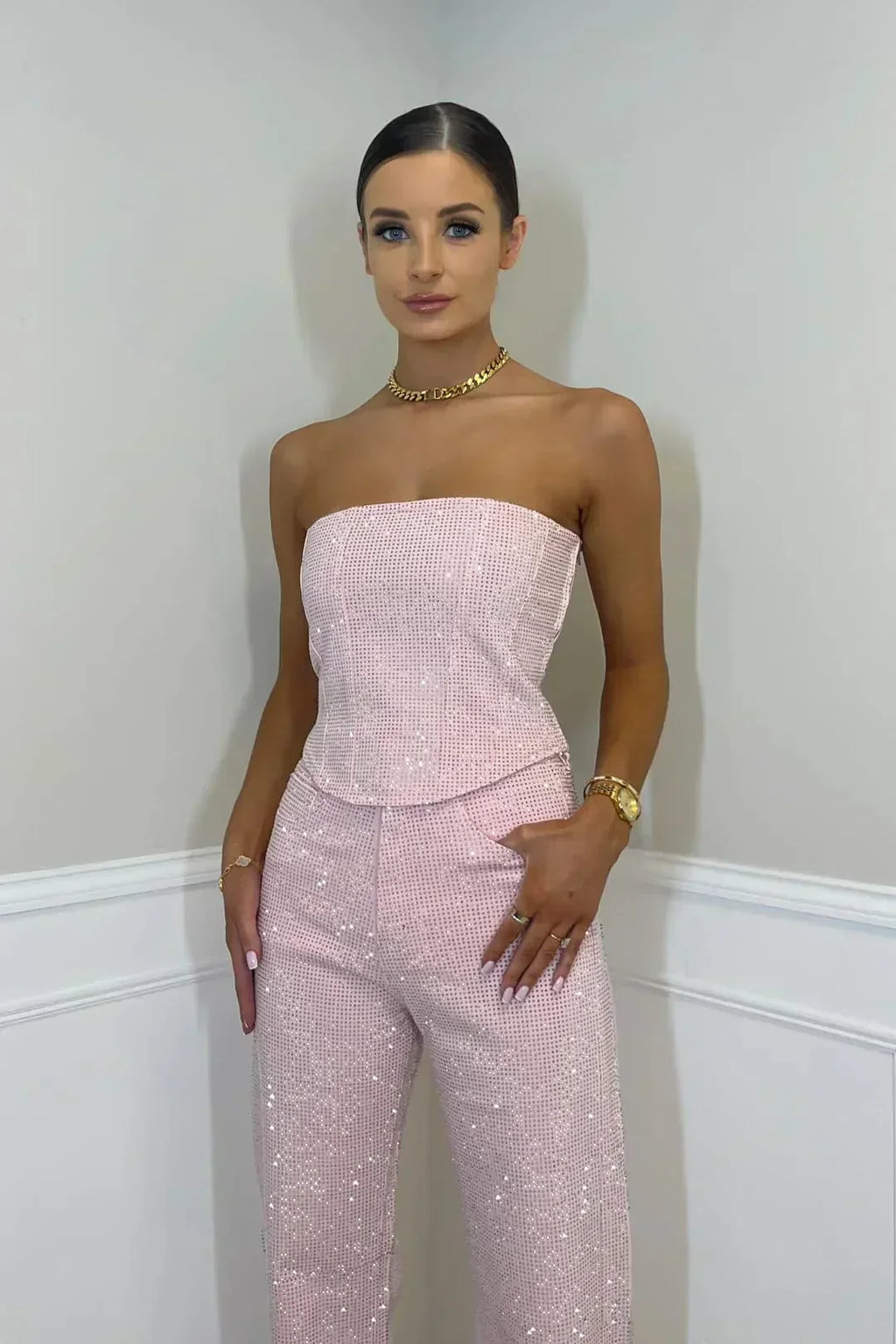 Bella Novelle glitter set met strapless crop top en jeans, productfoto