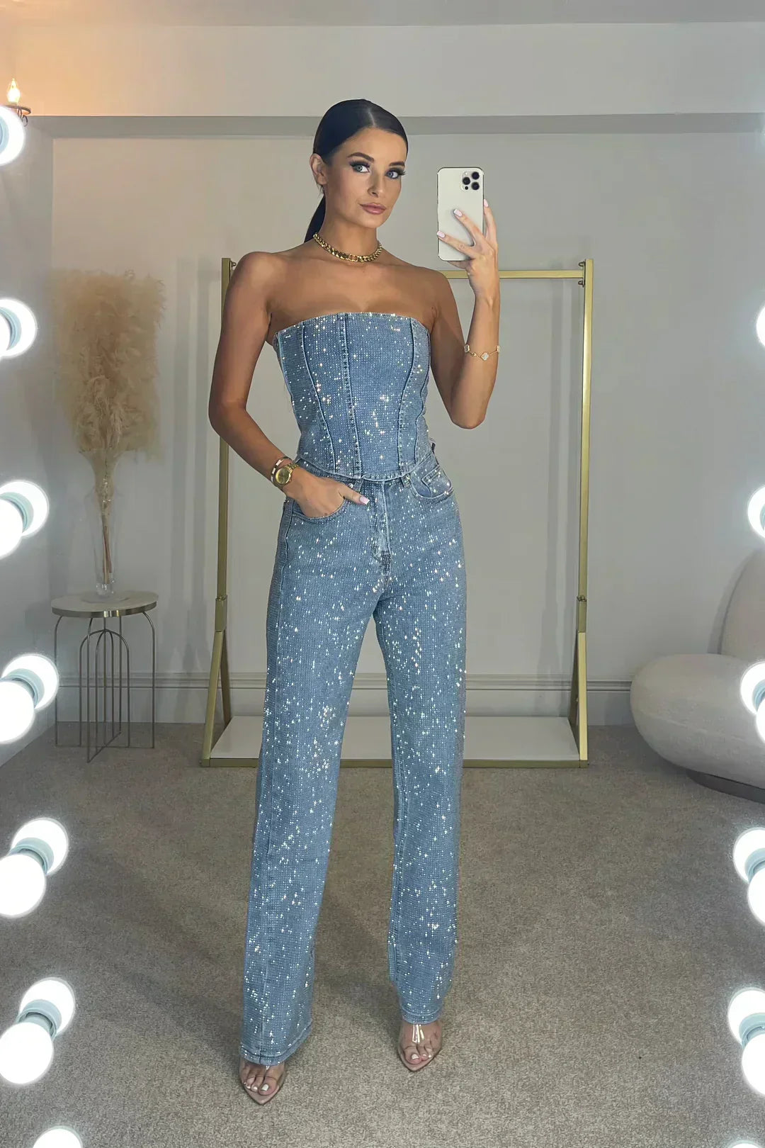 Bella Novelle glitter set met strapless crop top en jeans in lichtblauw