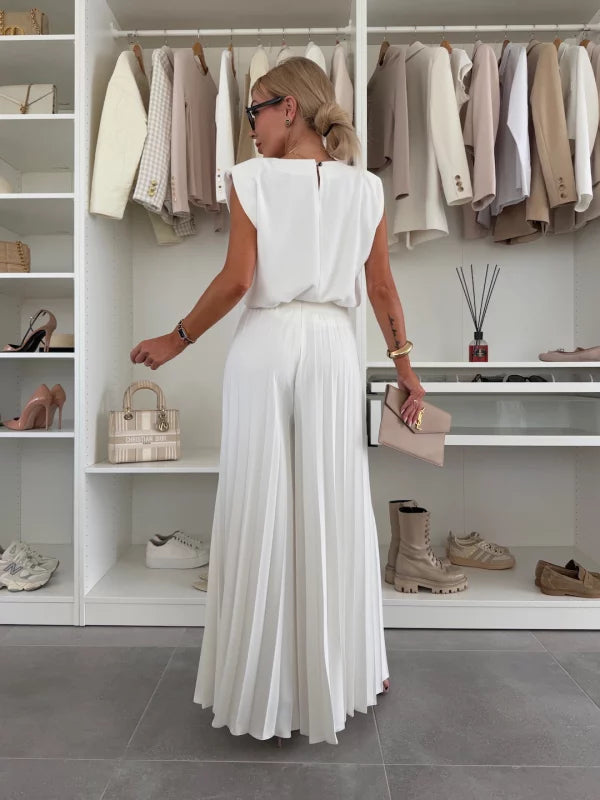 Bella Novelle set met mouwloze top en wijde plissé broek in crème