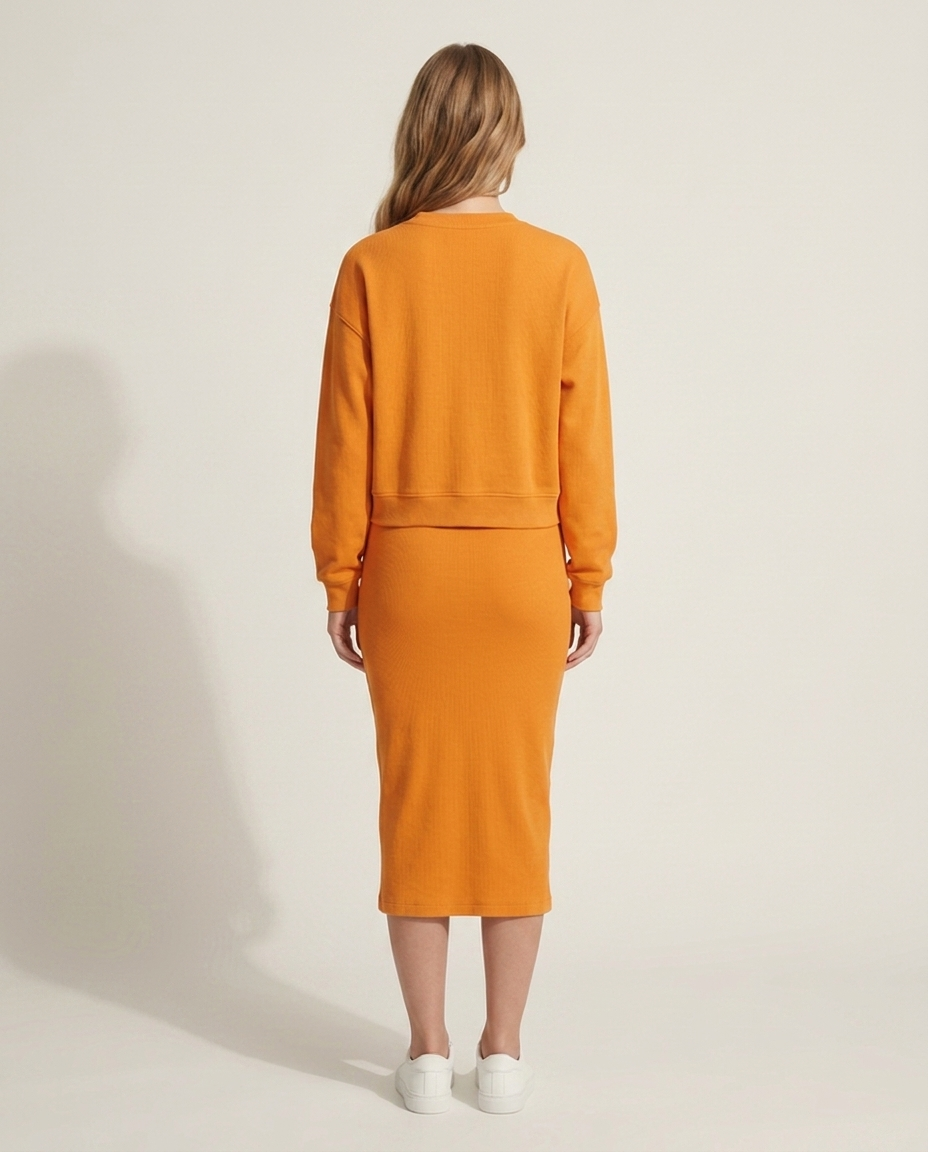 Sweatshirt en jurkset in oranje - achteraanzicht