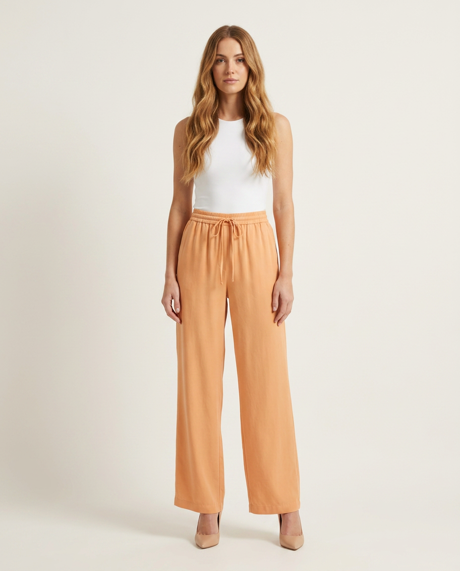 Wijde broek met hoge taille in abrikoos